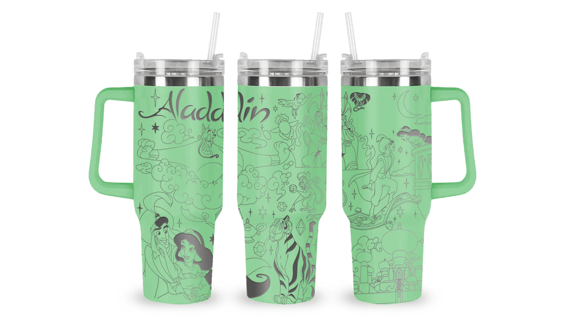 Stainless steel mug with an engraved Aladdin design, featuring Aladdin, Jasmine, the Genie, and Agrabah details.
