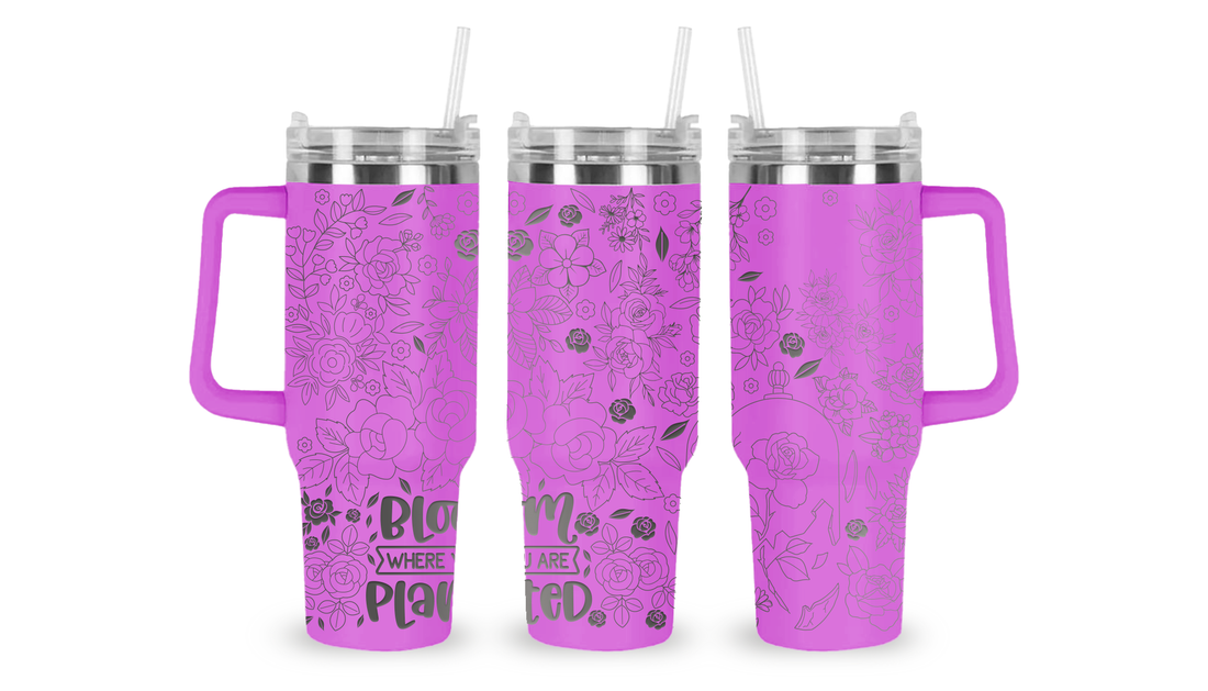 40oz stainless steel tumbler featuring an intricately engraved floral design. The detailed etching showcases delicate flowers and botanical patterns, adding a timeless and elegant touch to this high-capacity drinkware piece.