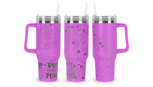 40oz stainless steel tumbler featuring an intricately engraved floral design. The detailed etching showcases delicate flowers and botanical patterns, adding a timeless and elegant touch to this high-capacity drinkware piece.