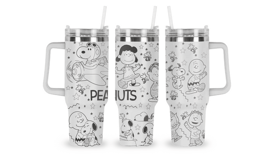 "Engraved tumbler featuring Snoopy in playful poses with stars, hearts, and Peanuts-inspired details.